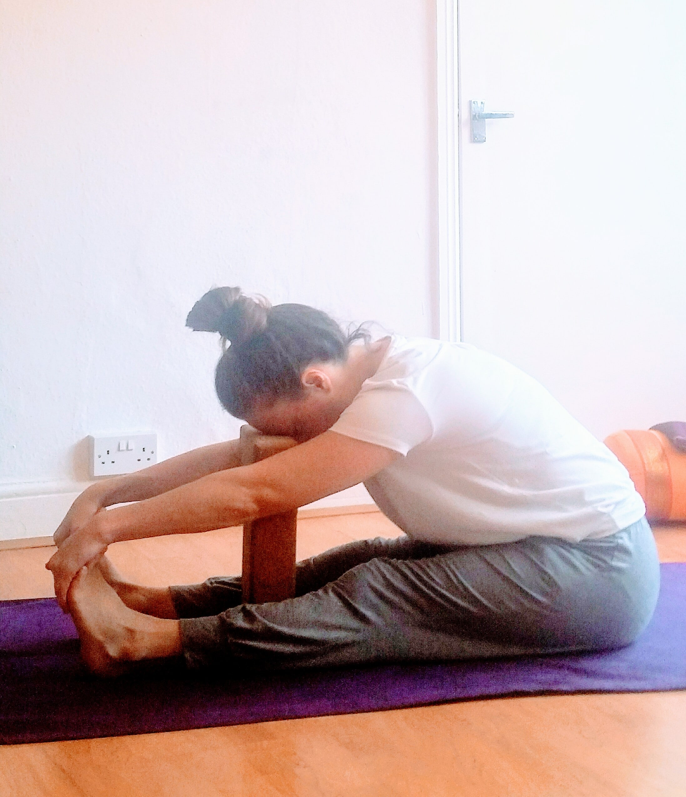 Indomnia seated forward fold